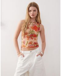Reclaimed (vintage) - – tanktop mit u-boot-ausschnitt und tropischem aquarell-blumenmuster - Lyst