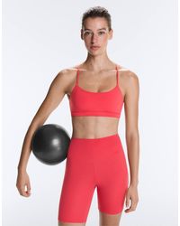 Oysho - Comfortlux Light-support Sports Bra With Crossover Straps - Lyst