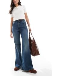 Levi's - Ribcage bells - jean évasé à taille haute et détail corset - moyen - Lyst