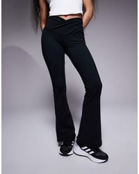 4505 - Petite Icon Wrap Waist Slim Kick Yoga legging - Lyst