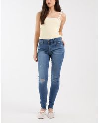 Levi's - 710 Super Skinny Jeans With Rips - Lyst