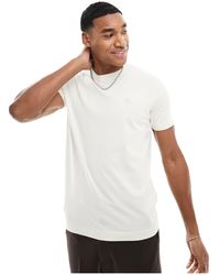 Abercrombie & Fitch - Elevated icon - t-shirt color crema con logo - Lyst