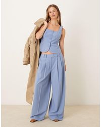 ASOS - Pantalones De Sastre Azules De Talle Bajo Y Pernera Muy Ancha Con Pinzas De - Lyst