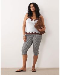 ASOS - Asos design curve - legging court en jersey à carreaux vichy - noir et blanc - Lyst