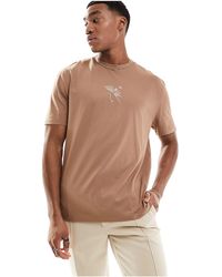 ASOS - T-shirt comoda color cuoio con stampa astratta sul petto - Lyst