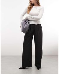 Weekday - Dara Pantaloni A Vita Bassa A Gamba Larga Con Pieghe Davanti A Quadri Scuro - Lyst