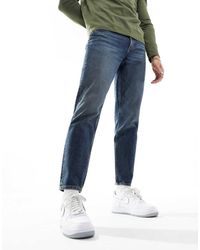 ASOS - Tapered Fit Jeans With Tinted Dark Wash - M - Lyst