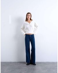 TOPSHOP - Pantaloni A Zampa A Vita Bassa - Lyst