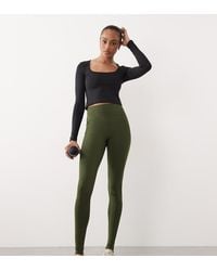 4505 - Tall Icon Active Tie Waist Run leggings With Phone Pocket - Lyst