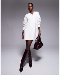 Aria Cove - Knit Oversized V Neck Balloon Sleeve Mini Sweater Dress - Lyst