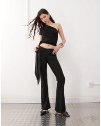 Lioness - Pantalon d'ensemble double épaisseur coupe près du corps évasée à taille basse et liens à nouer sur le côté - Lyst