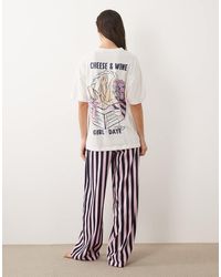 ASOS - Pyjamaset Van Top Met Korte Mouwen En Broek Met Kaas- En Wijnprint - Lyst