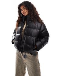 Karlkani - – serif – kurz geschnittene steppjacke aus pu - Lyst
