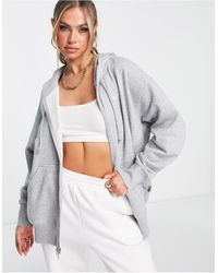 Nike - Sudadera y blanca extragrande con capucha, cremallera y logo pequeño - Lyst