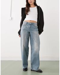 Weekday - Ample - jean ample à taille basse - clair délavé - Lyst