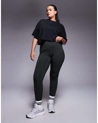 4505 - Curve Icon Active Bum Sculpt High Waist Gym legging With Inner Pocket - Lyst