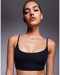 4505 - Icon Soft Touch Light Support Sports Bra With Adjustable Straps - Lyst