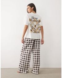 ASOS - Oversized Tee And Check Wide Leg Pant Pyjama Set With Slow Mornings Graphic - Lyst