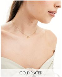 Orelia - – zierliche halskette mit 18-karat-vergoldung und geknotetem t-steg-anhänger - Lyst