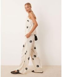 Aware - – hose aus satin - Lyst