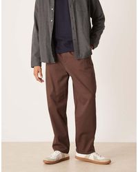ASOS - Pantalones Chinos Marrones De Corte Tapered Holgado Con Pinzas De - Lyst