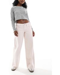 Hollister - Jean ultra baggy à taille basse - délavage clair surteint - Lyst