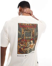 Timberland - – ungefärbtes, verwaschenes t-shirt mit "boots"- und labor-rückenprint - Lyst