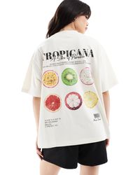 ASOS - T-shirt coupe boyfriend avec imprimé tropicana au dos - crème - Lyst