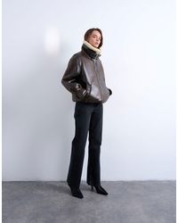 TOPSHOP - Oversized Tab Detail Shearling Bomber Jacket - Lyst