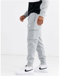 nike club cuffed woven cargo joggers in black