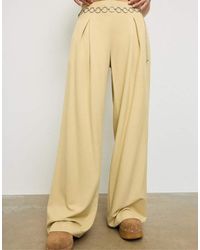 Stradivarius - Satin Trousers With Darts And Chain - Lyst