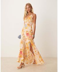 Never Fully Dressed - – träger-maxikleid aus satin mit blumenprint - Lyst