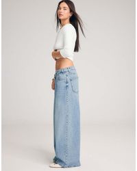 Stradivarius - Crossover Waist Jeans - Lyst