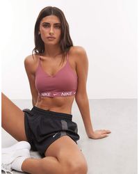 Nike - Dri-fit Indy Light Support Sports Bra - Lyst