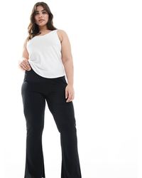 ASOS - Asos Design Curve Ribbed Flare Pants With Lettuce Hem - Lyst