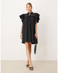 Y.A.S - Robe courte à volants oversize - Lyst