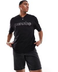 ASOS - T-shirt oversize nera con scollo a v e stampa con scritta invecchiata - Lyst