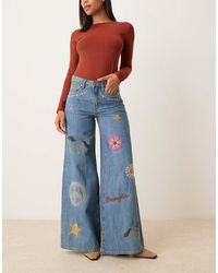 Wrangler - Vaqueros Azules De Pernera Ancha Con Bordados De X Lainey Wilson - Lyst