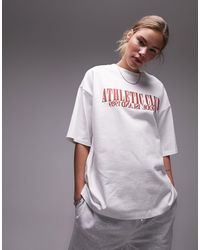 TOPSHOP - T-shirt oversize bianca con spalle scese e grafica "athletic club" - Lyst