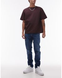 Tommy Hilfiger - Vaqueros Con Lavado Oscuro De Corte Tapered Slim Austin De -Azul Marino - Lyst