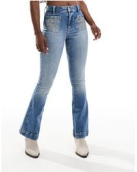 River Island - Flare Jean With Embroidered Pockets - Lyst