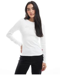 Levi's - Essential - t-shirt à manches longues et logo pailleté - Lyst