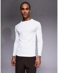 4505 - Seamless Rib Slim Fit Long Sleeve Raglan Top - Lyst