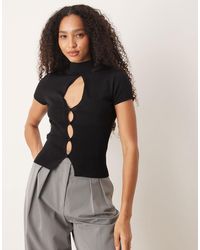 Mango - Top en maille à manches courtes et col montant avec découpe - Lyst