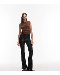 ASOS - Pantalones Negros De Corte Acampanado Slim Con Pinzas De Tejido Efecto Cuero De Asos Design Tall - Lyst