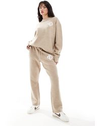 The Couture Club - Fluffy Emblem Knitted Trouser - Lyst