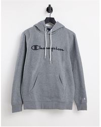 Sudadera negra con capucha y logo Champion de hombre de color Negro | Lyst