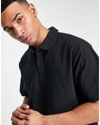Polo trèfle AB8298 adidas Originals pour homme en coloris Noir | Lyst
