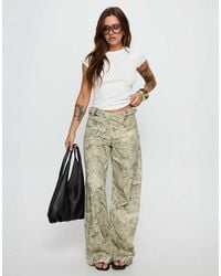 Princess Polly - Mckinley Cross Over Belt Detail Wide Leg Mid Rise Jeans - Lyst