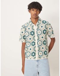 Abercrombie & Fitch - – kurzärmliges strick-polohemd mit zitrusmuster - Lyst